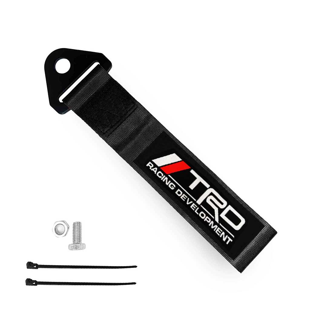 A black TRD JDM tow strap, a set of bolt and nut, and two zip ties on a white background