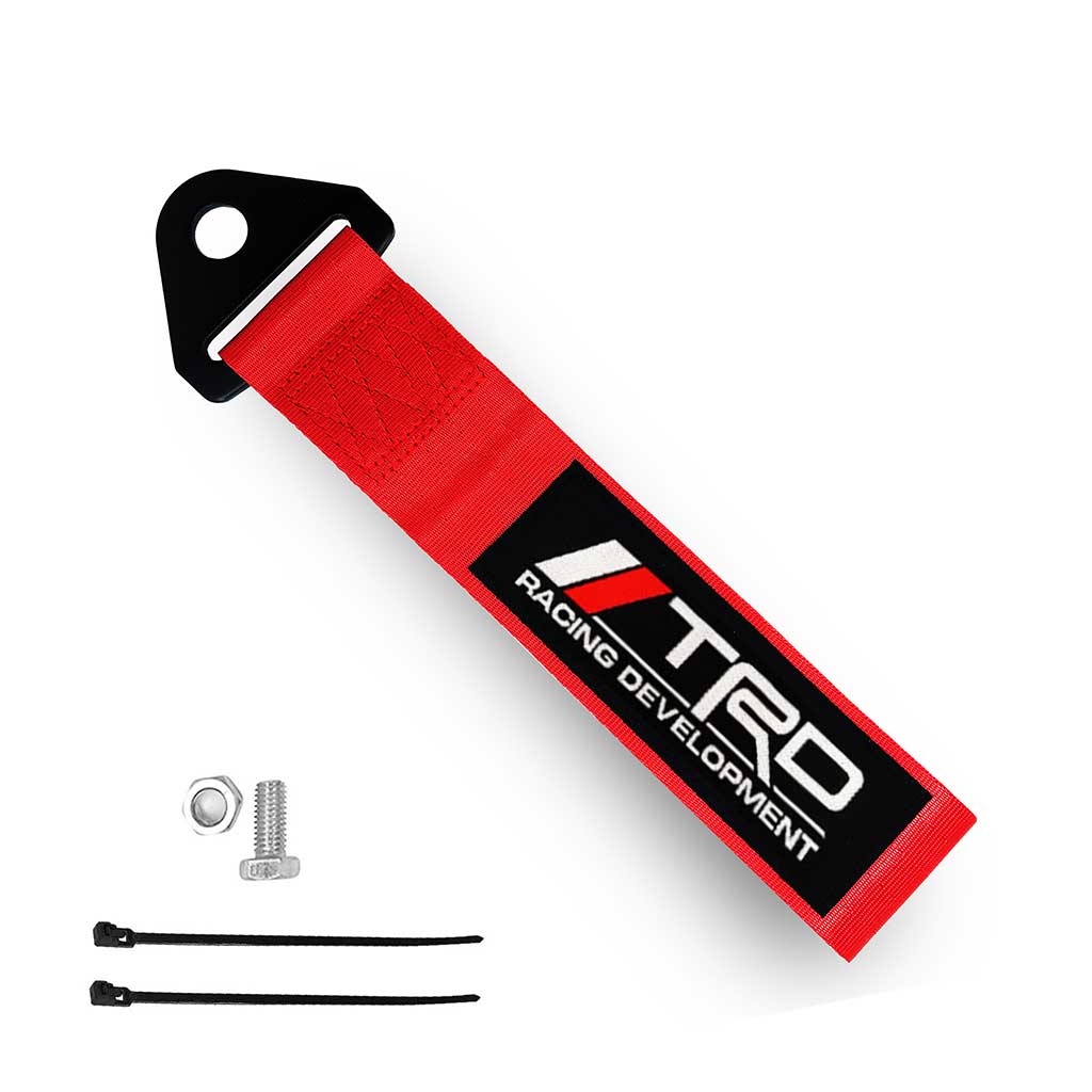 A red TRD JDM tow strap, a set of bolt and nut, and two zip ties on a white background