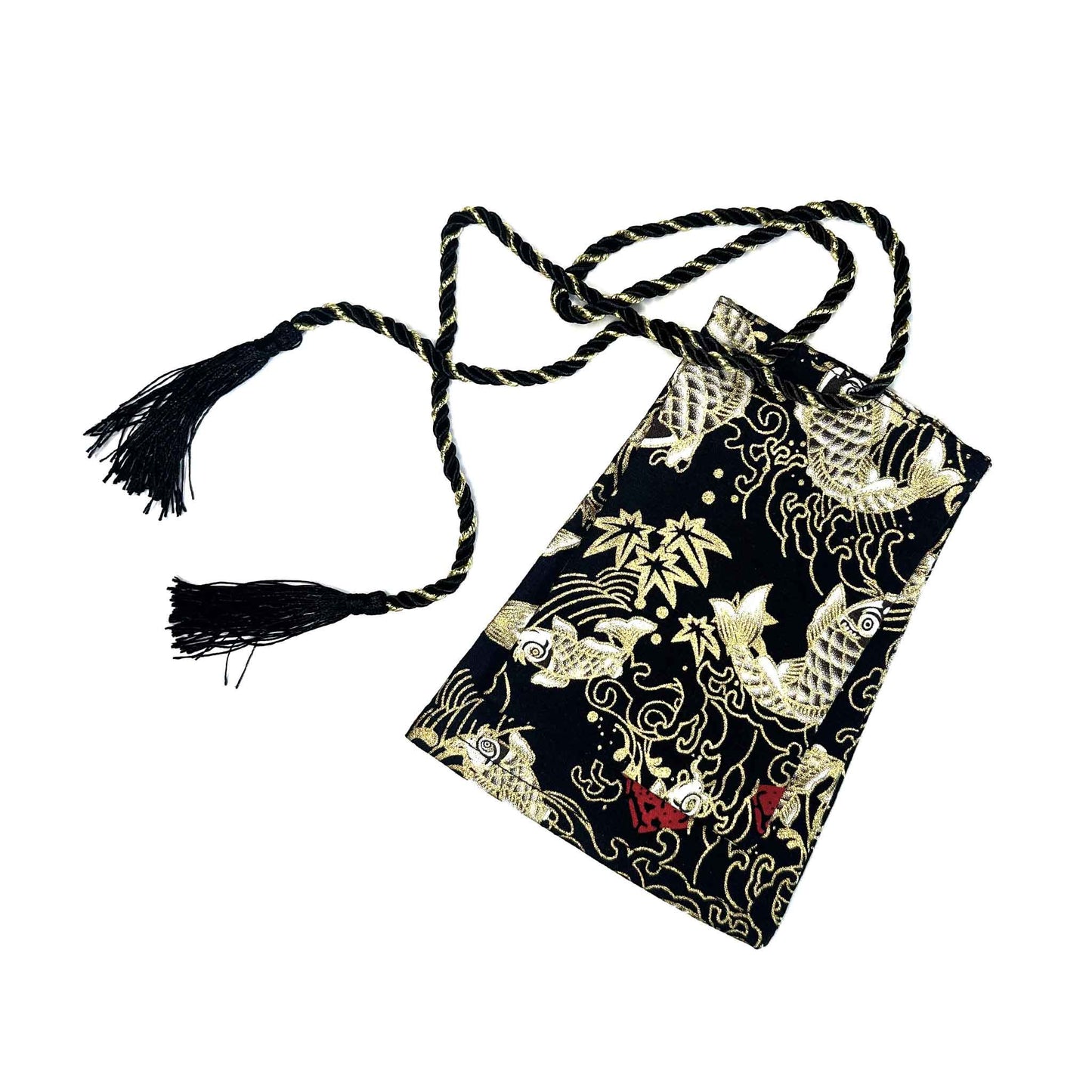 A black koi fish shift stick cover flat laid on a white background