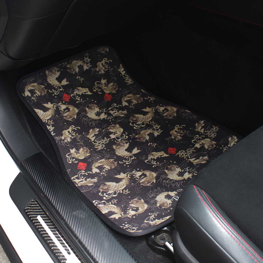 JDM floor mat with black koi fish design installed in a Toyota 86