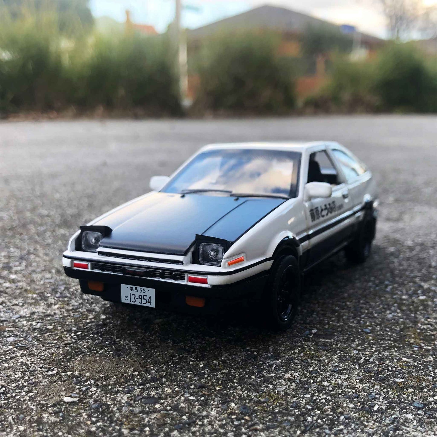 Front of an AE86 car model on concrete floor