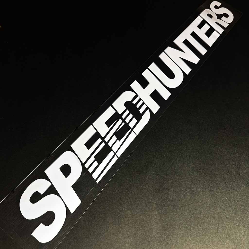 A Speed Hunters car vinyl decal is placed on a black background