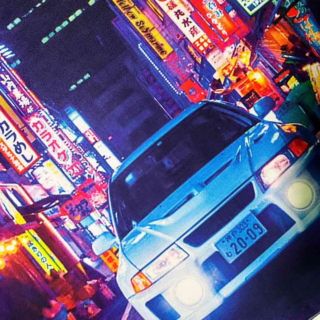 Close-up of an EVO wall art which is full of neon signs at the back of the EVO car
