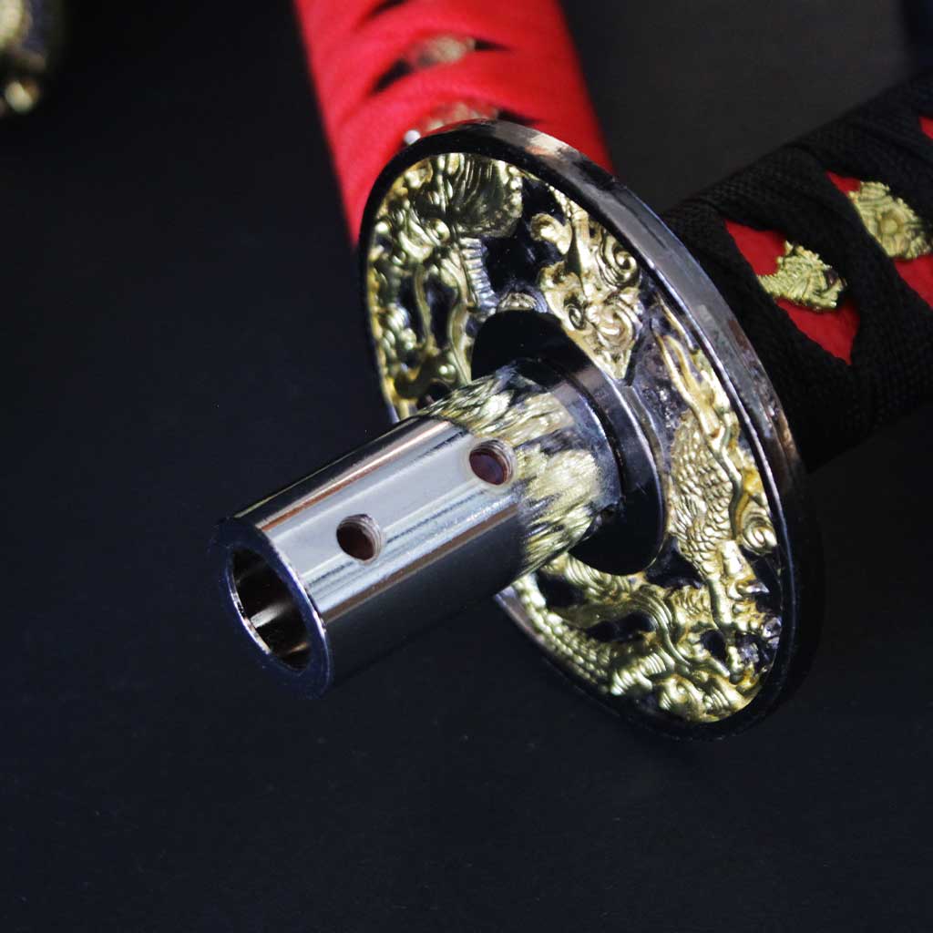 Close-up of the bottom compartment of a red katana shifter