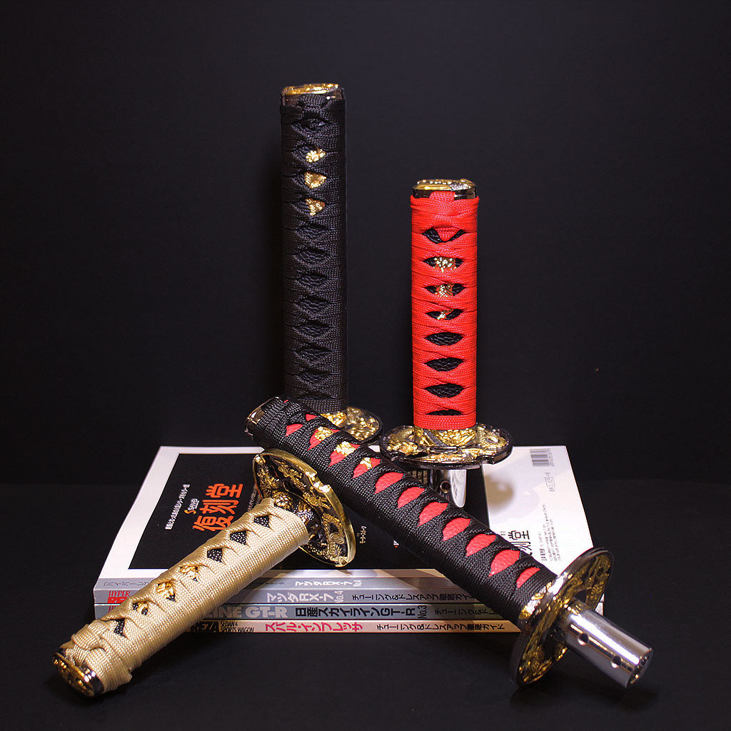Katana sword shift knobs stand aesthetically in front of a black wall