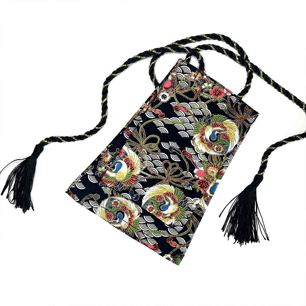 A flying cranes shift stick cover flat laid on a white background