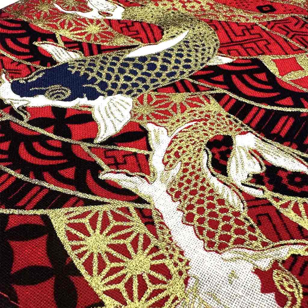 Close-up of a red koi fish shift stick cover