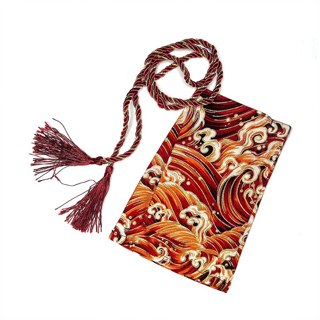 A red waves shift stick cover flat laid on a white background
