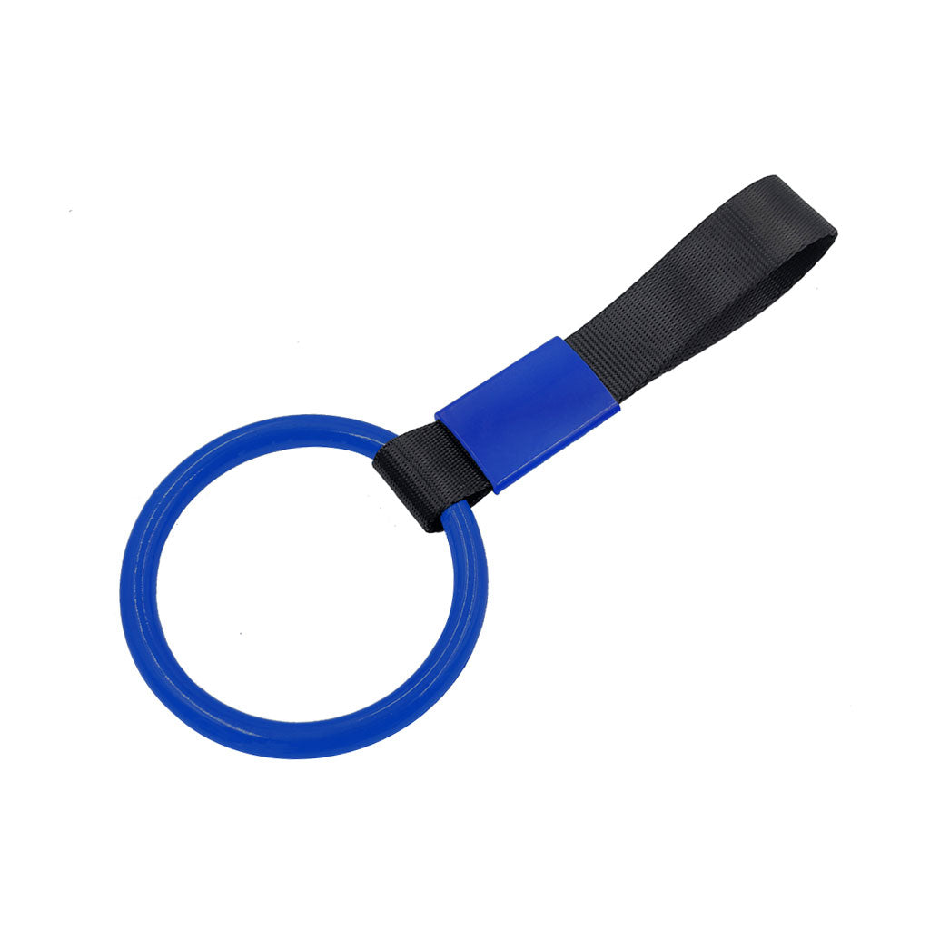 A blue ring tsurikawa with black handle strap flat laid on a white background