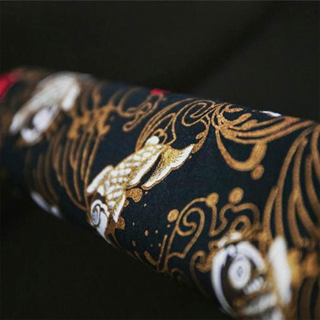 Close-up of the black koi fish seat belt cover