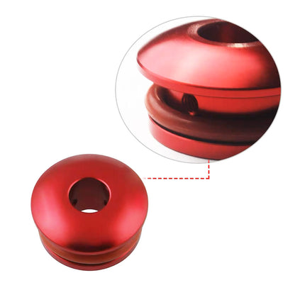 A red non-threaded boot retainer on a white background with a bubble above it showcasing the details