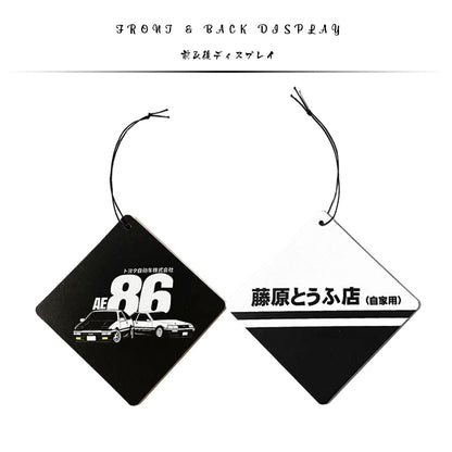 Front and back of the ae86 air freshener