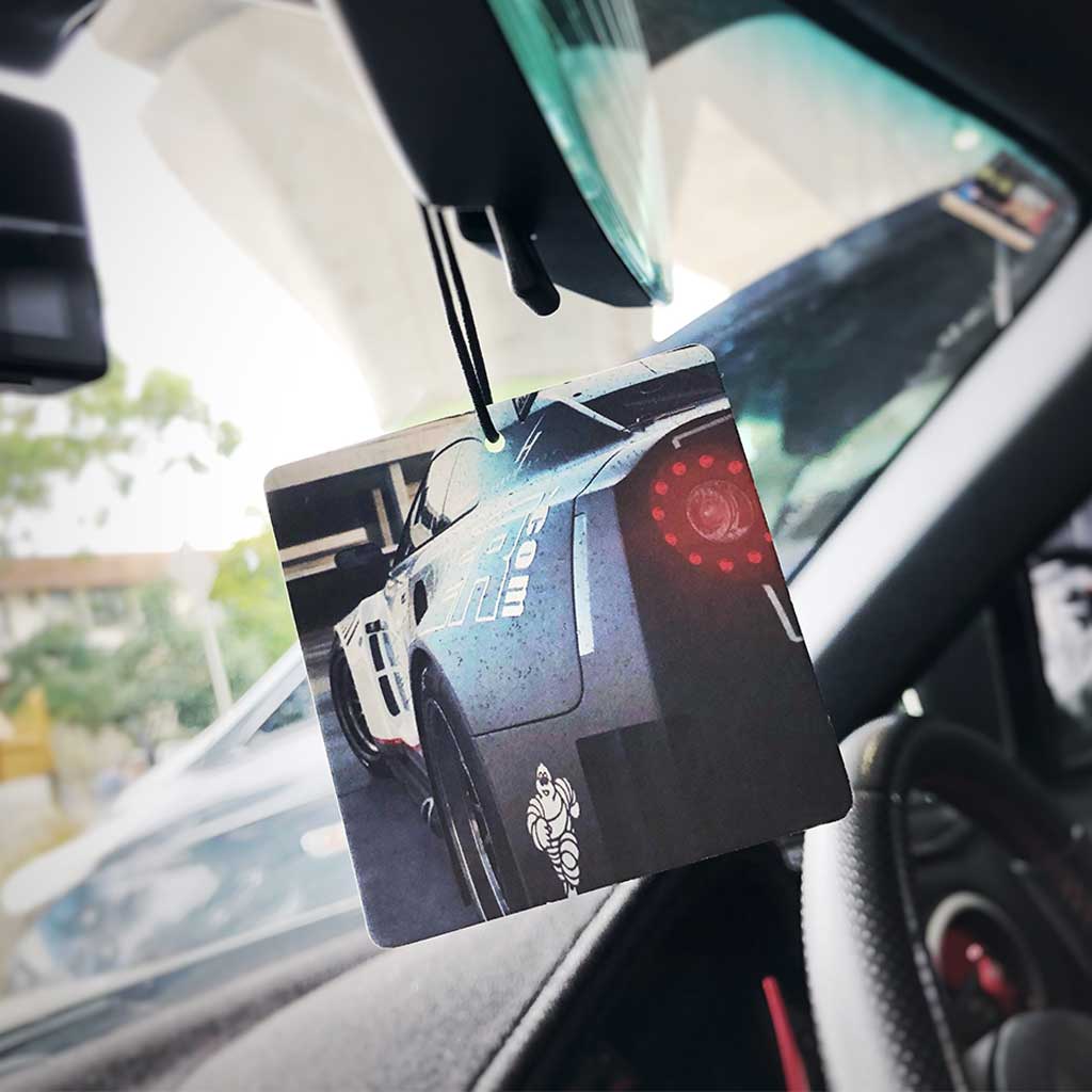A skyline r35 air freshener hung in a car