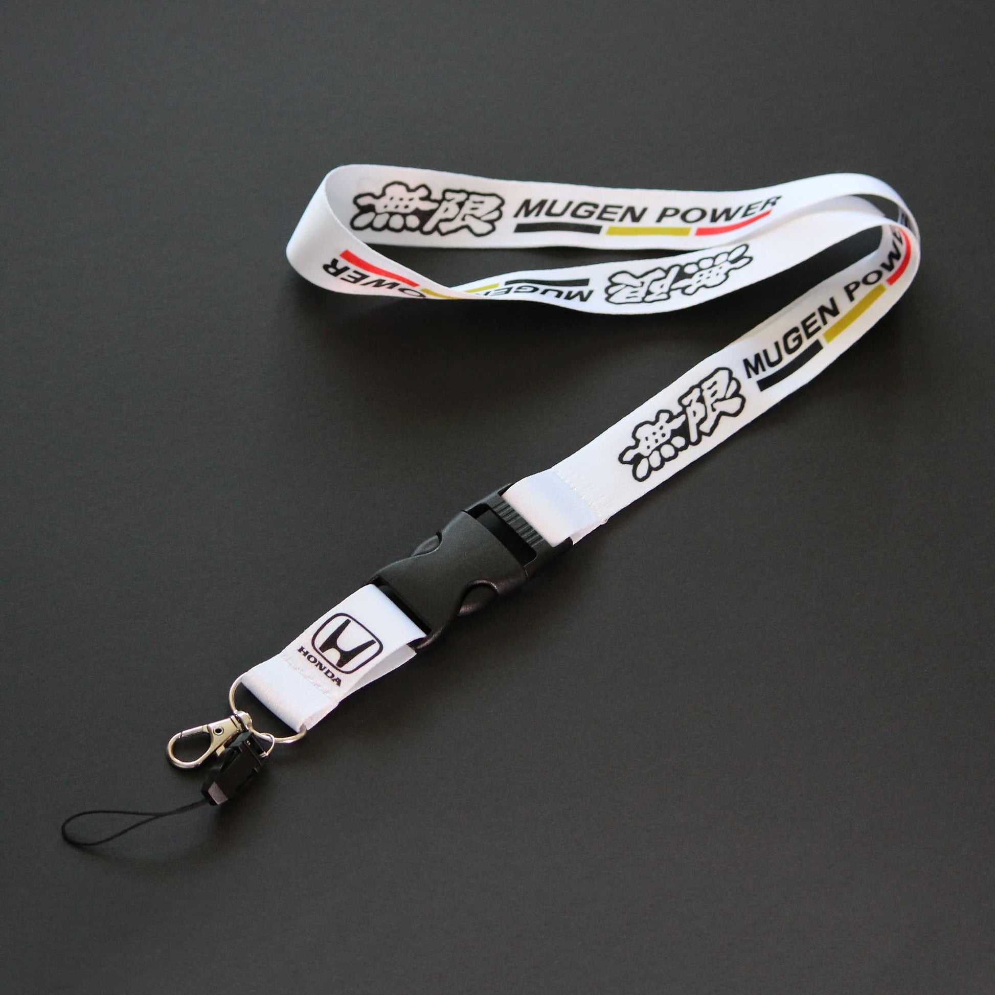 A white Honda Mugen Power lanyard on a black background