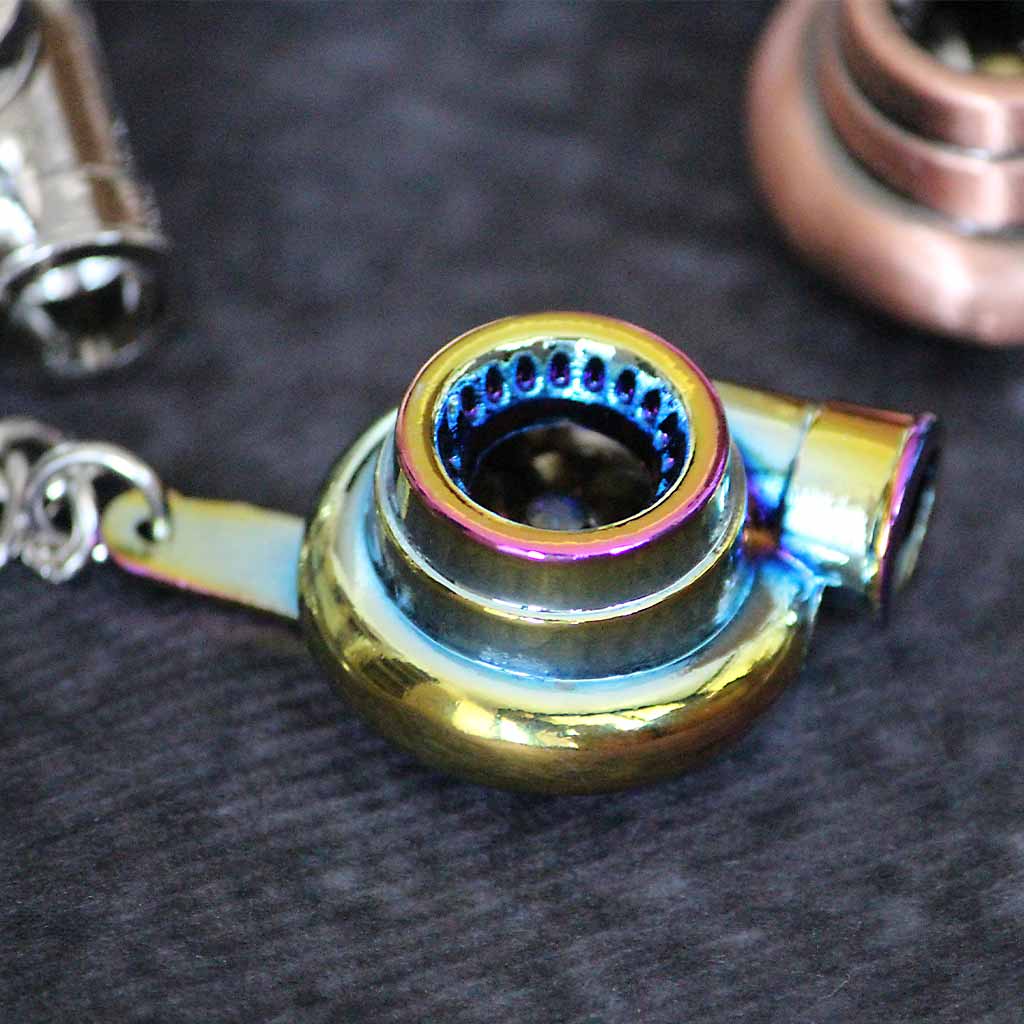 Close-up of a rainbow turbo keychain