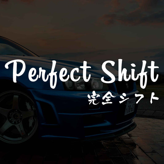 JDM car sticker with English and Japanese saying 'Perfect Shift' flat laid on a GTR background