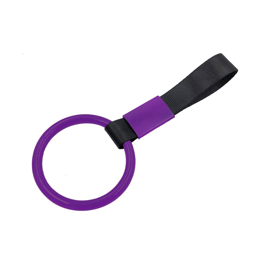 A purple ring tsurikawa with black handle strap flat laid on a white background