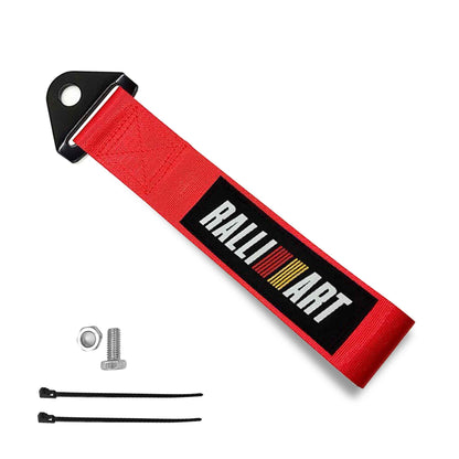 A red ralli-art tow strap, a set of bolt and nut, and two zip ties on a white background