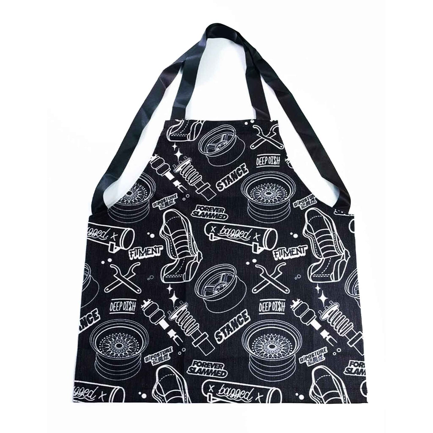 A black JDM-themed apron with writings 'stance, forever slammed, fitment, bagged' on a white background