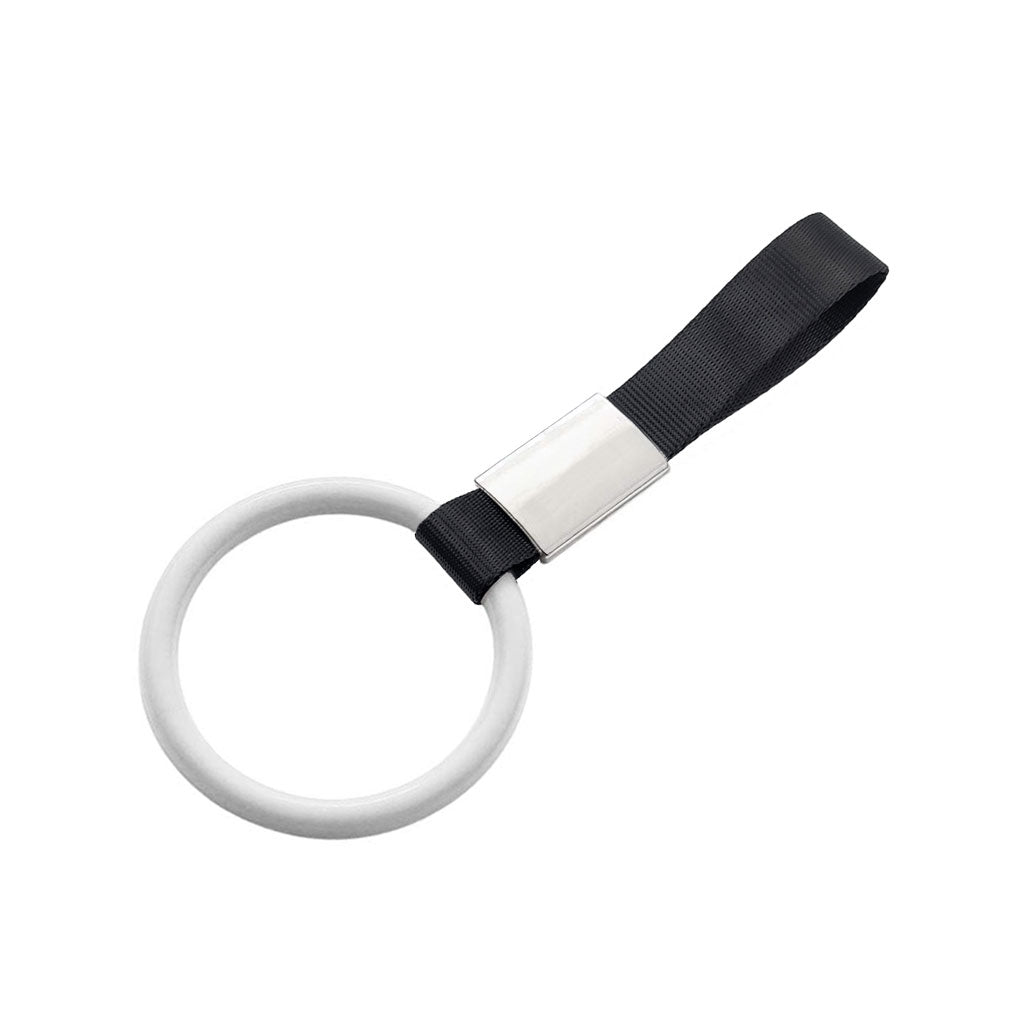 A white ring tsurikawa with black handle strap flat laid on a white background